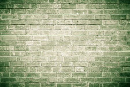 Background of vintage color tone old brick wall textureの写真素材