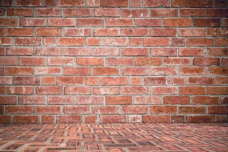 textured red brick and brick floor with old deserted interior, brickwork conceptの写真素材