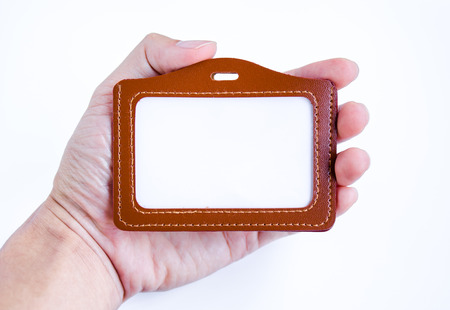 Brown leather label tag with string isolated on the white background.の写真素材