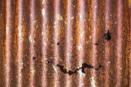 Rusted galvanized iron plateの写真素材