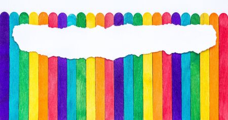 colorful wooden wall texture with Torn paper background empty for add textの写真素材