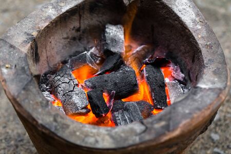 Old fireplace, old stove, fireの写真素材