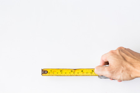 man hand hold Measuring Tape, isolated on white background
