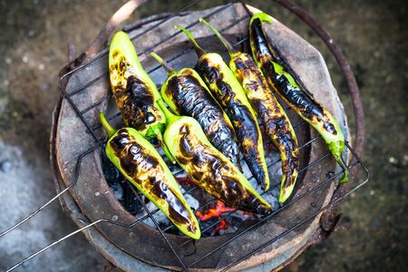 Pepper grilled over charcoalの写真素材