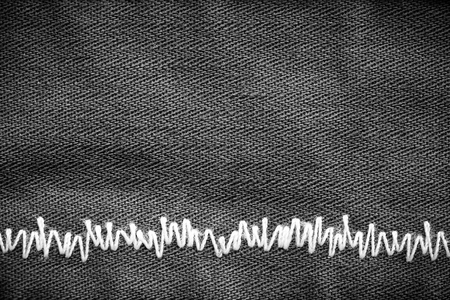 color jeans background with seams threadの写真素材