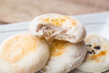 Traditional Chinese cake on wooden background.の写真素材
