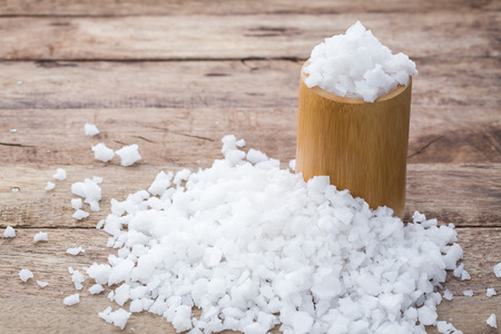 Sea salt on wooden tableの写真素材