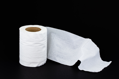Toilet paper roll with black backgroundの写真素材