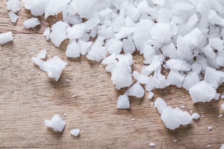 Sea salt on wooden tableの写真素材