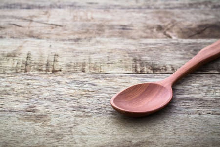 empty wooden spoon on the wood table.の写真素材