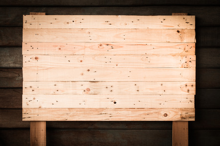 vintage tone of Wooden sign isolated on white. Wood old planks sign.の写真素材