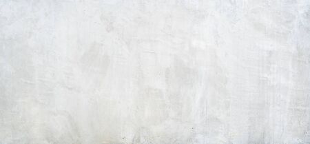 Abstract grungy white concrete seamless background. Stone texture for painting on ceramic tile wallpaper. Cement grunge backdrop for design art work and pattern.の写真素材
