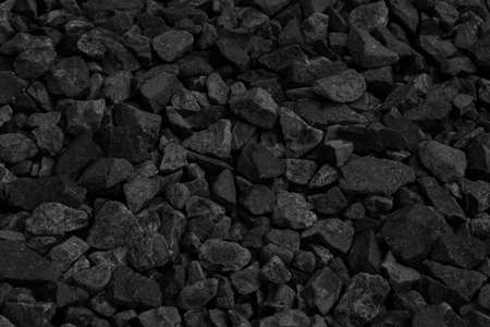 Natural black coals for background design. Industrial coals. Volcanic rock energy on earth.の写真素材