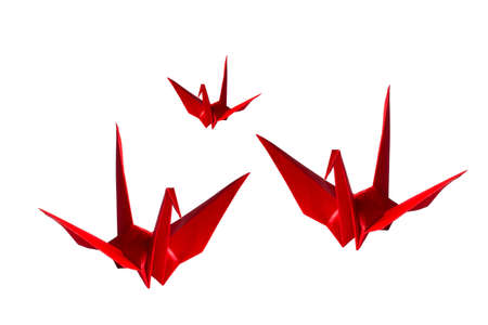 Red paper origami birds on white background. Japan pigeon origami flying bird abstract background for di-cut for design.の写真素材