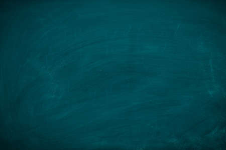 Green Chalkboard. Chalk texture school board display for background. chalk traces erased with copy space for add text or graphic design. Backdrop of Education conceptsの写真素材