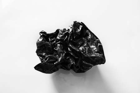 Empty plastic bag isolated on white background. Illustration of reducing plastic bags to help reduce global warmingの写真素材