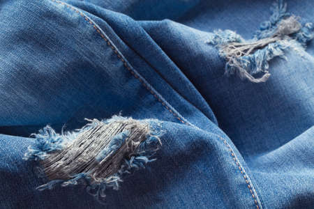Retro color tone of blue denim jeans fabric texture for background website fashion design or backdrop product.の写真素材
