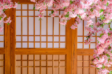 Artificial Sakura flowers for decorating japanese style. Spring blossom. backdrop for design or add text message.の写真素材