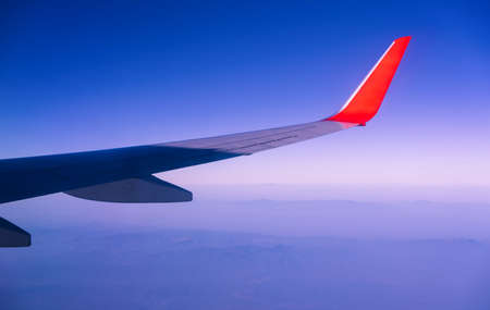 Wing of an airplane. Photo applied to tourism operators and fast and efficient transportation. picture for add text message or art work frame website. Traveling concept.の写真素材