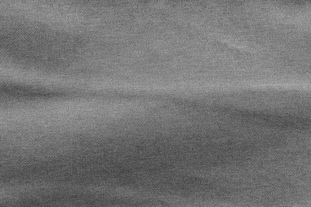 Canvas Polyester texture synthetical for background. Black fabric textile backdrop for interior art design or add text message.の写真素材