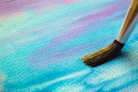 Abstract Hand painted Watercolor Colorful wet background with paint brushes on paper. Watercolor texture for creative wallpaper or design art work. Pastel colors toneの写真素材
