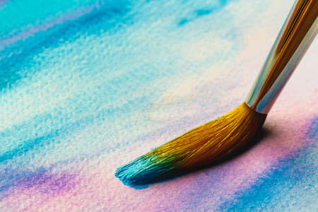 Abstract Hand painted Watercolor Colorful wet background with paint brushes on paper. Watercolor texture for creative wallpaper or design art work. Pastel colors toneの写真素材