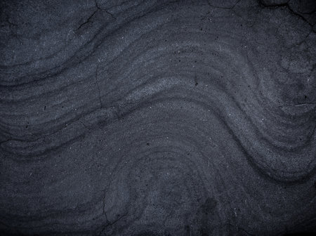 Abstract grungy black concrete seamless background. Stone texture for painting on ceramic tile wallpaper. Cement grunge backdrop for design art work and pattern.の写真素材