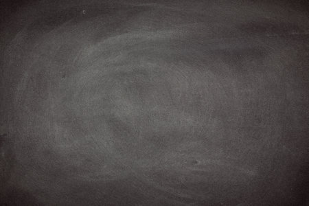 Abstract Chalk rubbed out on blackboard or chalkboard texture. clean school board for background or copy space for add text message. Backdrop of Education concepts.の写真素材