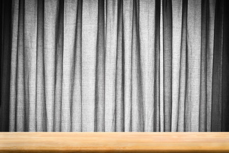 Abstract Natural wood table with grey curtain background : Top view of plank wood for graphic stand product, interior design or montage display your productの写真素材