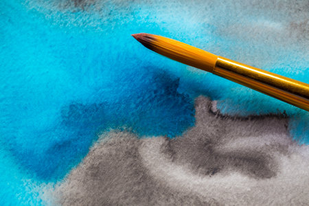 Abstract Hand painted Watercolor Colorful wet background with paint brushes on paper. Watercolor texture for creative wallpaper or design art work. Pastel colors toneの写真素材