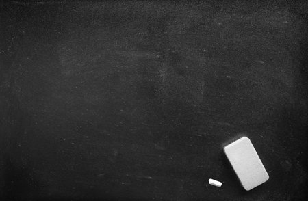 Abstract Chalk rubbed out on blackboard or chalkboard texture. clean school board for background or copy space for add text message. Backdrop of Education concepts.の写真素材