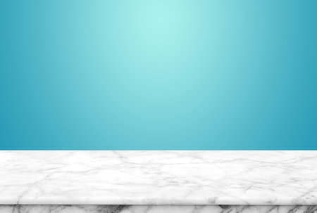 Abstract Natural texture marble floor on bright blue background : Top view of marble table for graphic stand product, interior design or montage display your product.の写真素材
