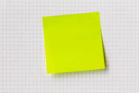 White note paper bookmark with sticker note on book lined pages.の写真素材