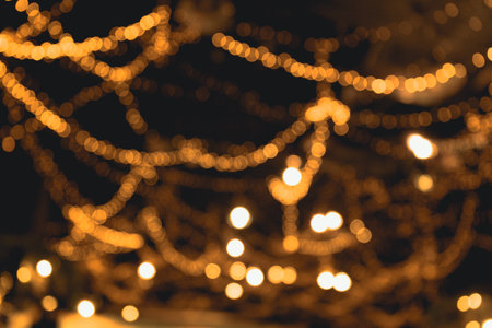 Abstract Blurred bokeh lights in the city. Background illustration with light colours for backdrop design or add text message.の写真素材