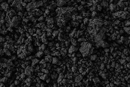 Natural black coals for background design. Industrial coals. Volcanic rock energy on earth.の写真素材