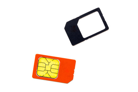 red sim card on white background. Technology of telephoneの写真素材