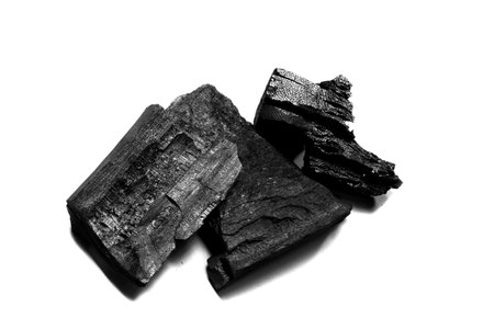 Natural black charcoal from old tree. High wood energy coal for warm in the winter or for household.の写真素材