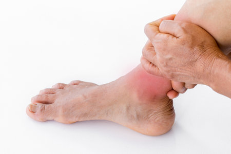 Women have ankle pain due to walking for a long time.の写真素材