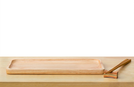 Empty sushi bamboo tray board on wood table white background. Bamboo products that have been processed into trays for use in the kitchen. Top view of plank wood for graphic stand design product.の写真素材