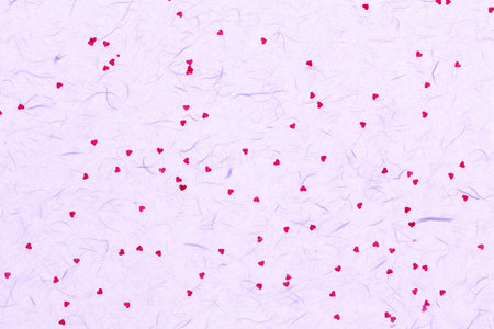 mulberry paper with red hearts. valentine background