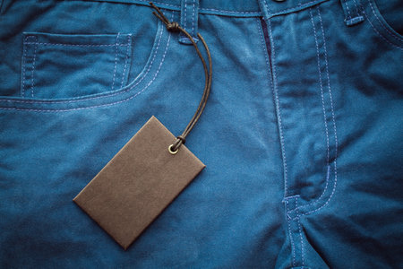 vintage tone of blue jean with blank label for filling textsの写真素材