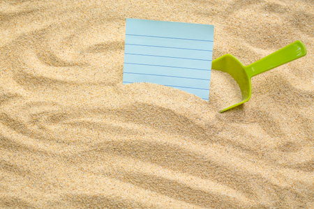 Summer style with empty blank paper on a sea sand. white card background for add text.の写真素材