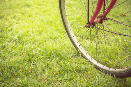 Vintage bicycle on grass. Image has shallow depth of field.