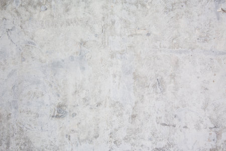 white concrete seamless background. Stone texture for painting on ceramic tile wallpaper. Cement grunge backdrop for design art work and pattern.の写真素材