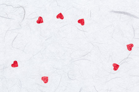 mulberry paper with red hearts. valentine backgroundの写真素材