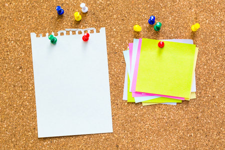 abstract paper note pin on cork board. cork board with blank notes. sticker noteの写真素材