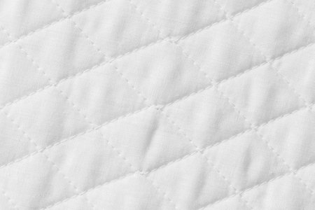 white mattress bedding pattern background. backdrop surface for design art work.の写真素材