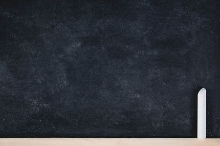 Chalk rubbed out on blackboard for background. picture for add text or education background.の写真素材