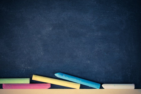 Chalk rubbed out on blackboard for background. picture for text or education background.の写真素材