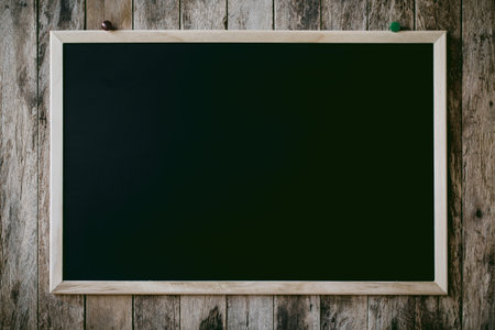 Abstract empty Blank chalkboard magnet with paper note and sticker note in wooden frame isolated on wooden background. empty space for add text.の写真素材